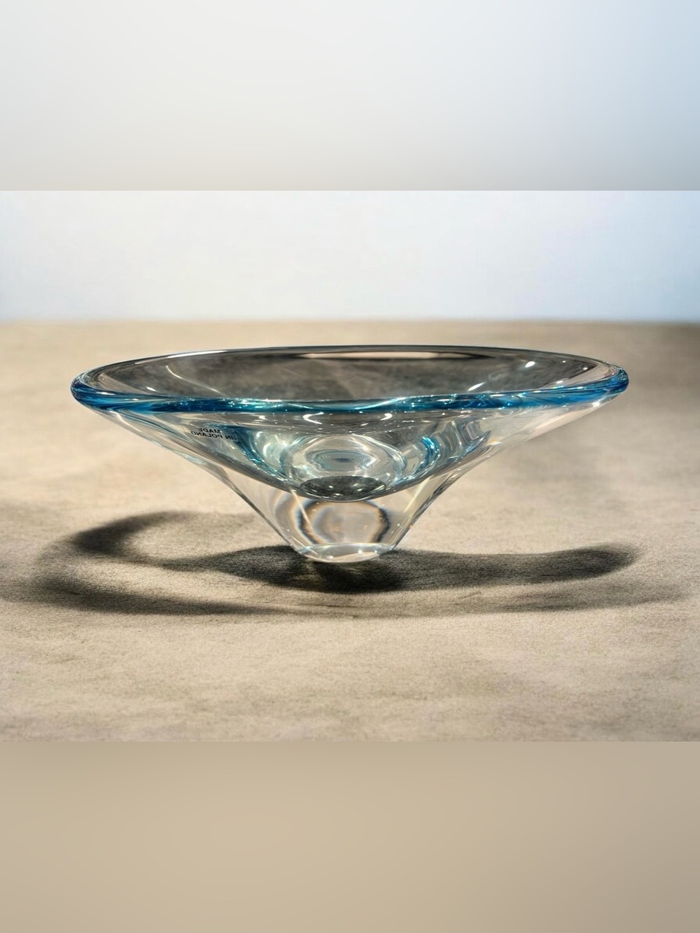 MCM Hand-blown Polish art glass console bowl with a blue rim.